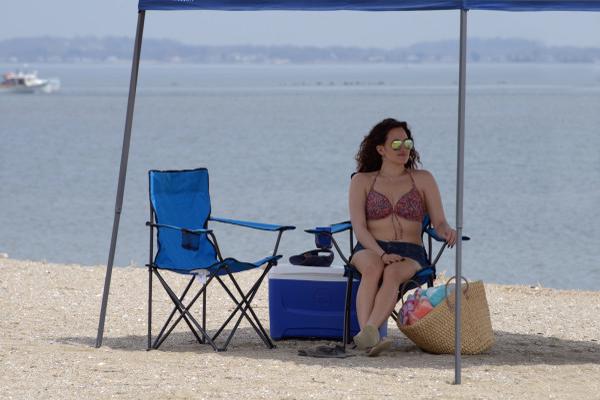 Quik Shade Folding Chair - Blue (146111DS) This folding chair can give you the comfort and relaxation that you need on your beach trips! 