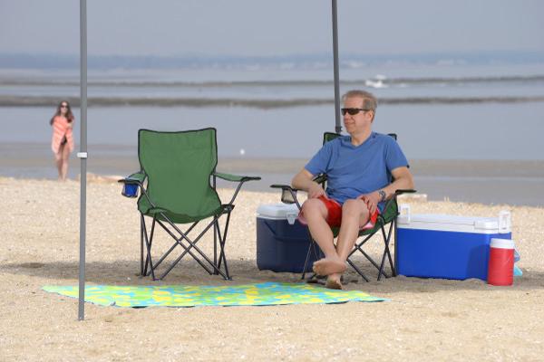 Quik Shade Folding Chair - Green (146109DS) This folding chair can give you the comfort and relaxation that you need on your beach trips! 